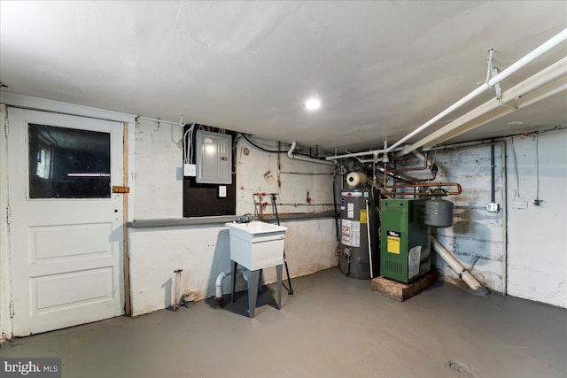 basement with electric panel and gas water heater