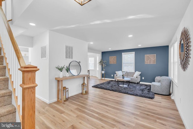 living room featuring light wood-type flooring