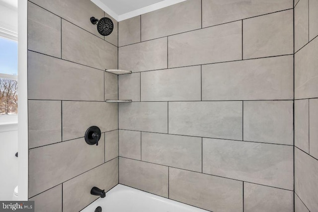 room details featuring tiled shower / bath