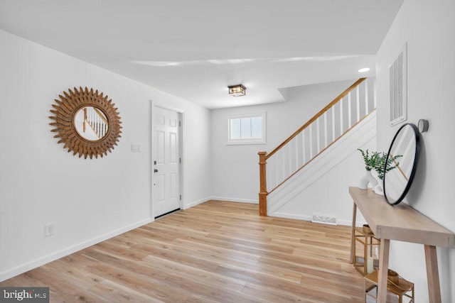 entrance foyer featuring light hardwood / wood-style floors