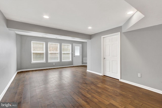 interior space with dark hardwood / wood-style floors