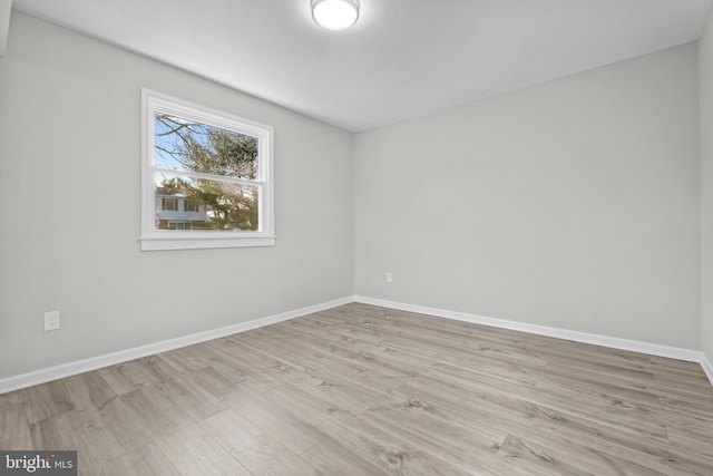 empty room with light wood-type flooring