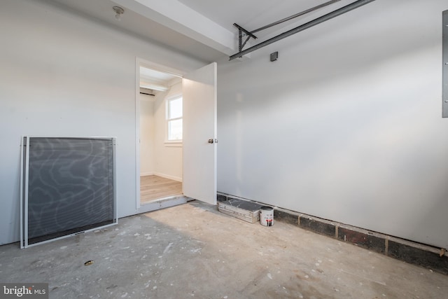 interior space featuring concrete flooring