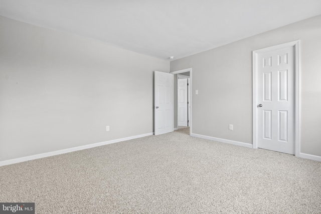 empty room featuring carpet floors