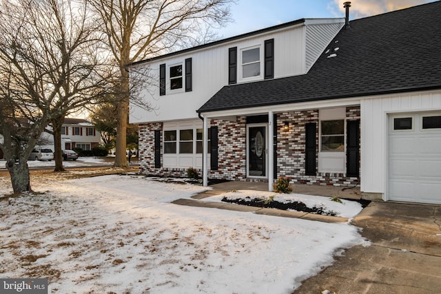 view of front of property with a garage