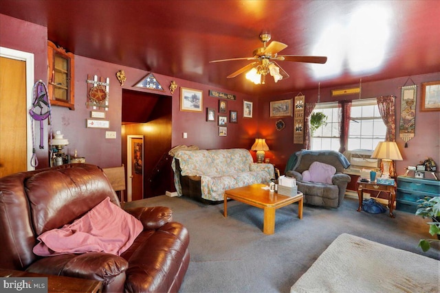 living area featuring carpet and ceiling fan