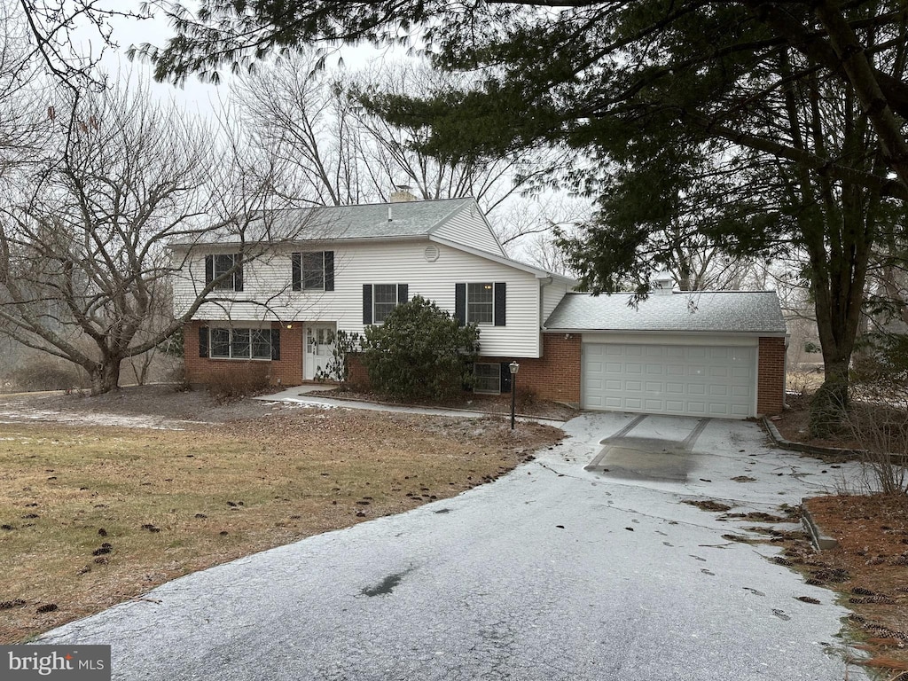 view of front of property with a garage