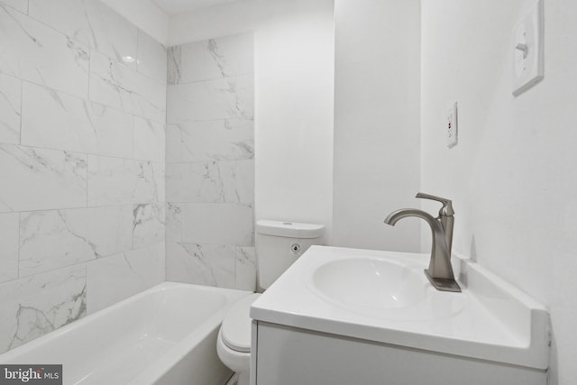 bathroom with toilet and vanity