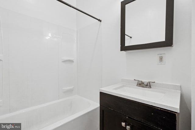 bathroom with bathtub / shower combination and vanity