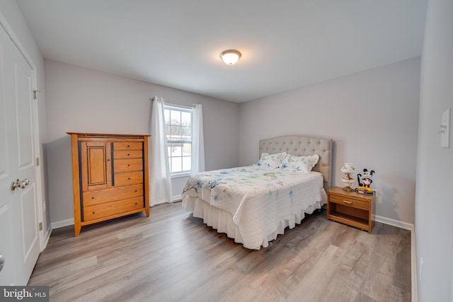 bedroom featuring light wood-type flooring