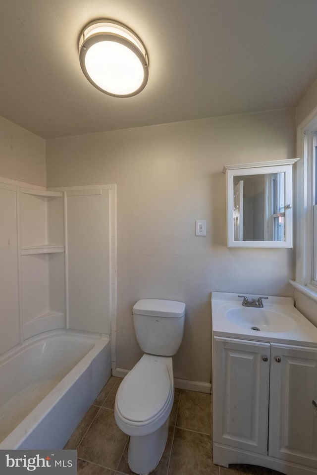 full bathroom featuring toilet, shower / bathtub combination, tile patterned floors, and vanity