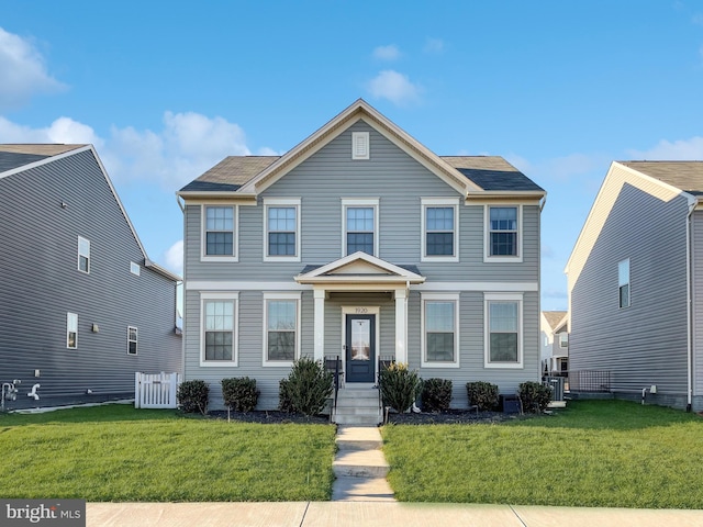 view of front of house featuring a front lawn