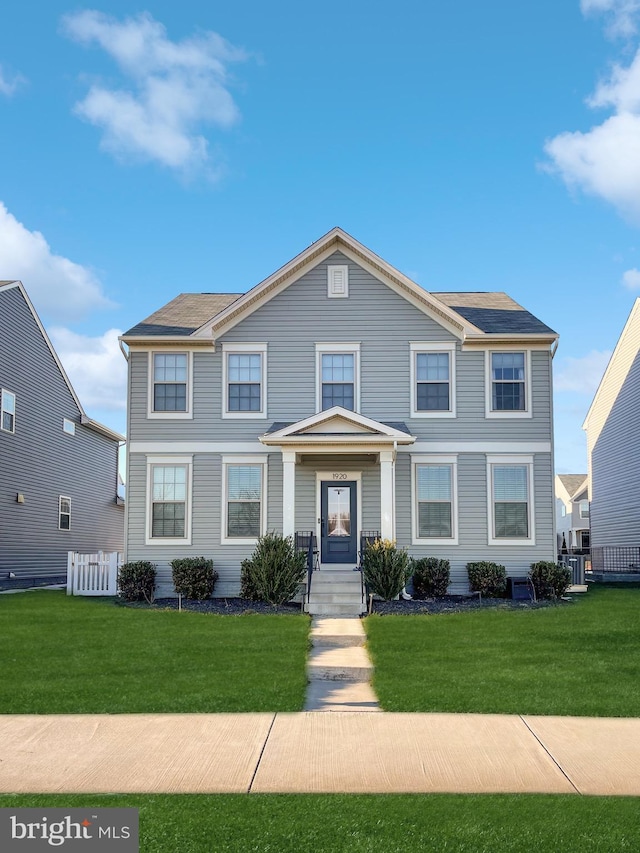 view of front facade with a front lawn