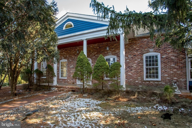 view of greek revival inspired property