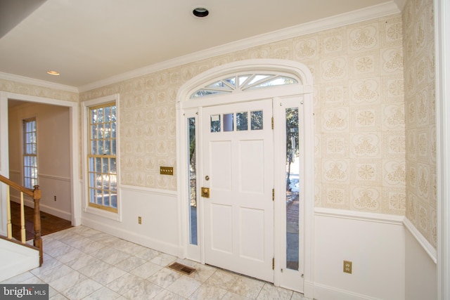 foyer entrance with ornamental molding