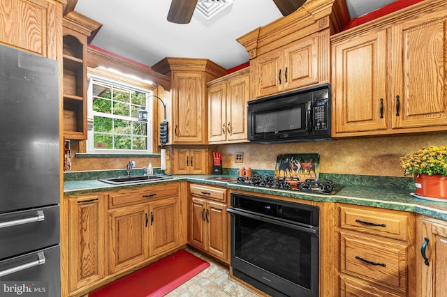 kitchen with black appliances and ceiling fan