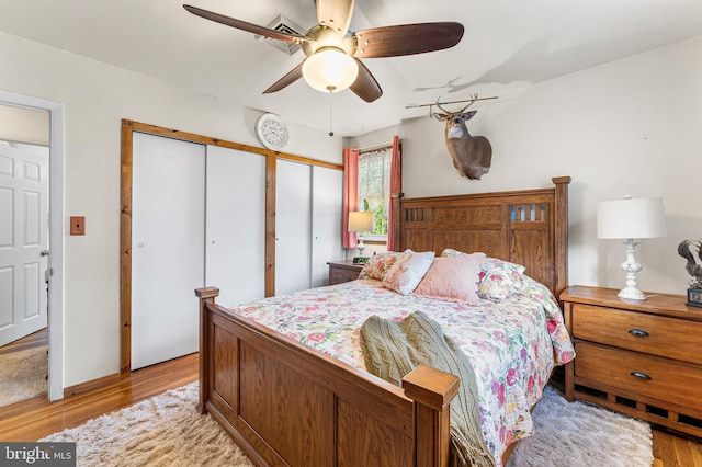 bedroom featuring ceiling fan and light wood-type flooring