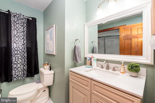 862 Bay Ave, Toms River, NJ 08753 - bathroom with vanity, a shower, and toilet