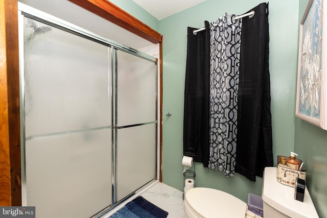 862 Bay Ave, Toms River, NJ 08753 - bathroom with a shower with shower door and toilet