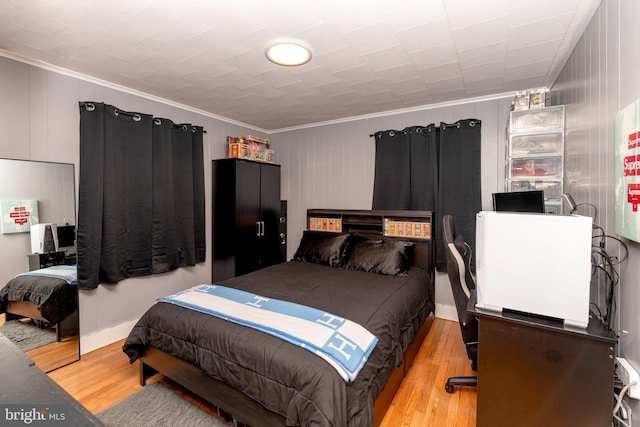 862 Bay Ave, Toms River, NJ 08753 - bedroom with crown molding and light hardwood / wood-style flooring
