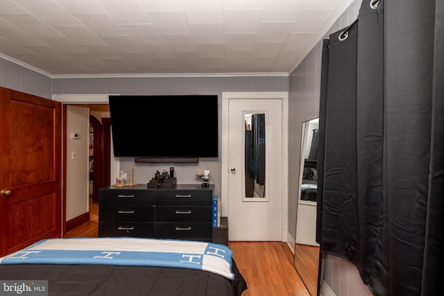 862 Bay Ave, Toms River, NJ 08753 - bedroom featuring ornamental molding and light hardwood / wood-style flooring