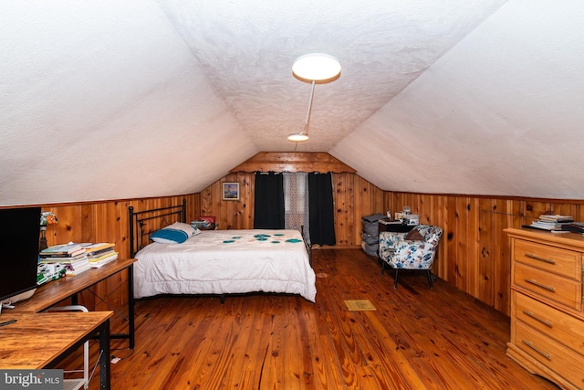 862 Bay Ave, Toms River, NJ 08753 - bedroom featuring vaulted ceiling, dark hardwood / wood-style flooring, and a textured ceiling