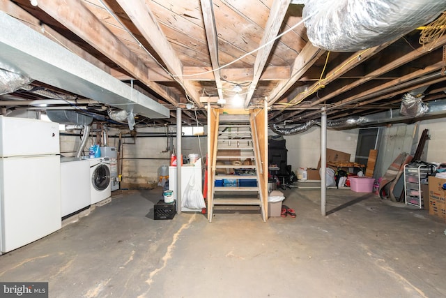 862 Bay Ave, Toms River, NJ 08753 - basement featuring washing machine and dryer and white fridge