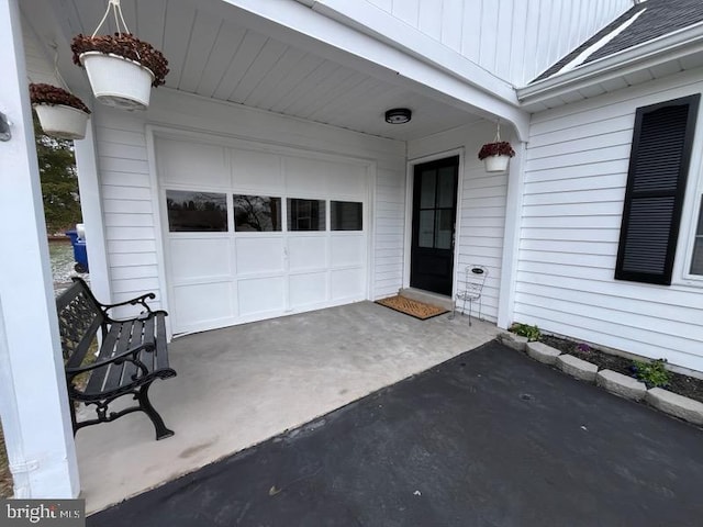 entrance to property with a garage