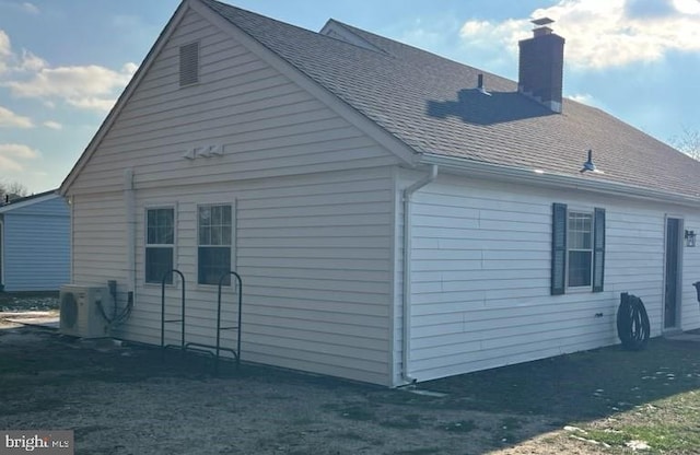 view of property exterior featuring ac unit