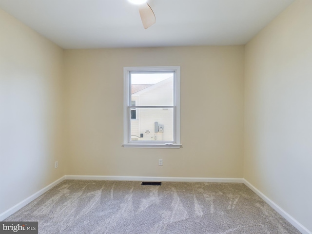 unfurnished room with carpet floors