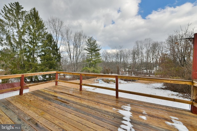 view of snow covered deck