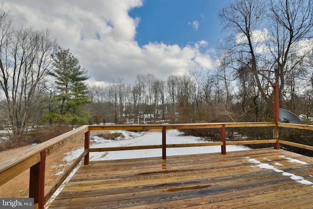 view of snow covered deck