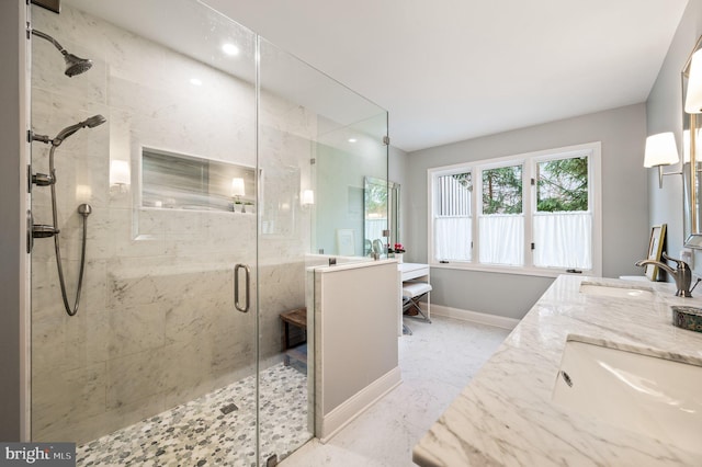 bathroom featuring vanity and walk in shower