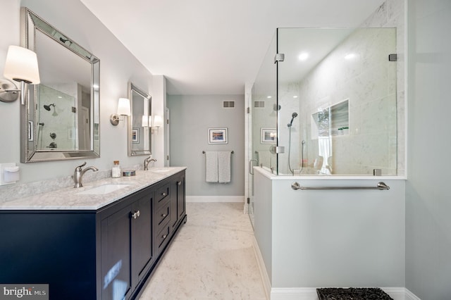 bathroom featuring walk in shower and vanity