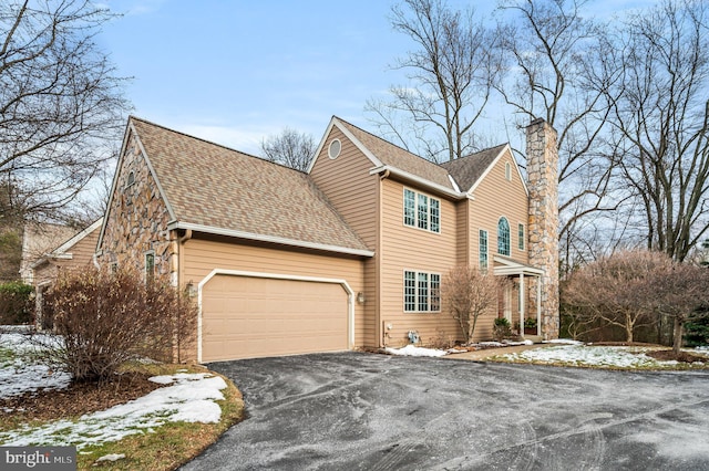 front of property with a garage