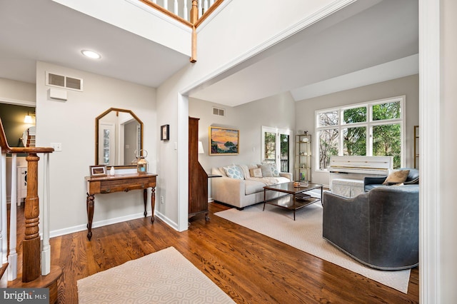 living room with dark hardwood / wood-style floors