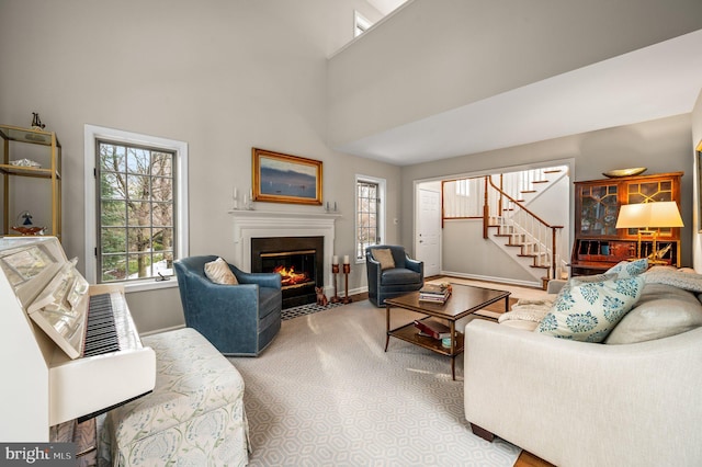 living room with a high ceiling