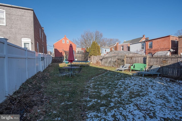 view of yard featuring a trampoline