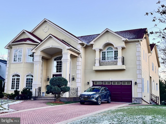 view of front of property with a garage