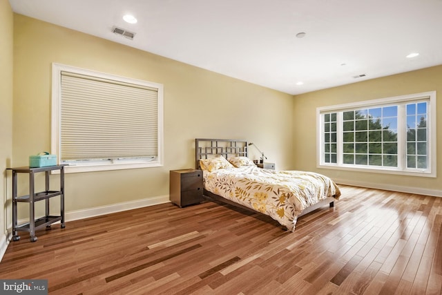 bedroom featuring wood-type flooring