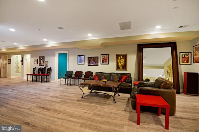 living room with light hardwood / wood-style floors