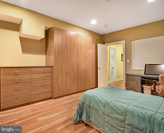 bedroom featuring light hardwood / wood-style flooring