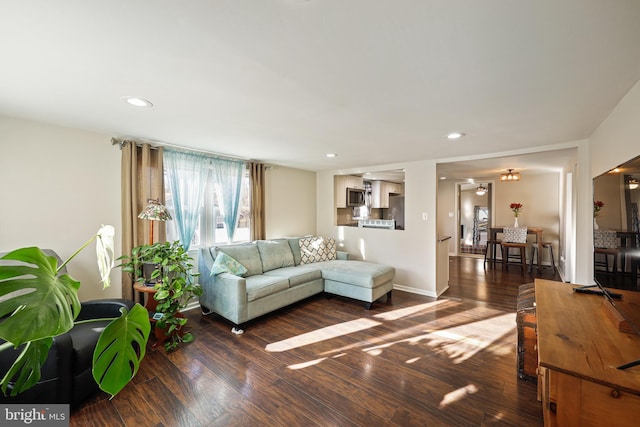 living room featuring dark hardwood / wood-style flooring