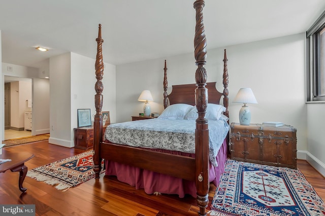 bedroom featuring wood-type flooring