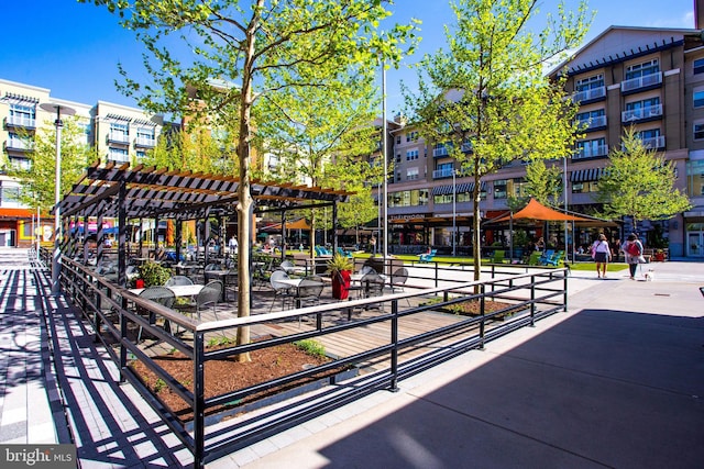 view of home's community with a pergola