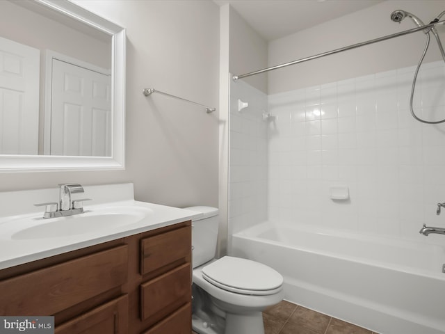 full bathroom with tile patterned flooring, vanity, shower / washtub combination, and toilet