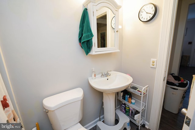 bathroom featuring toilet