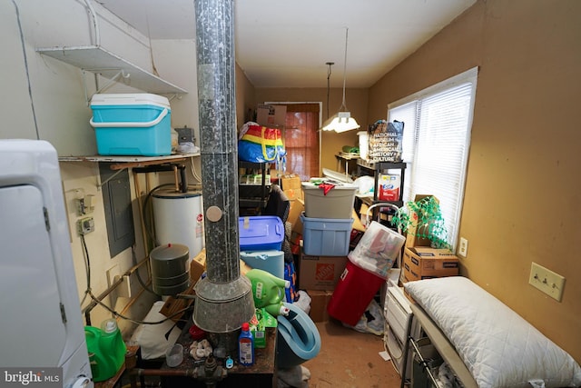 storage room featuring washer / clothes dryer and water heater