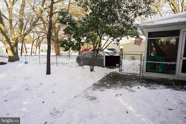 view of yard covered in snow