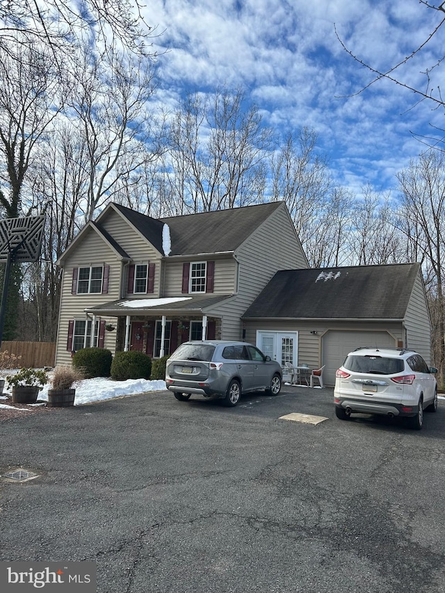 view of front of property featuring a garage